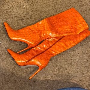 Orange Knee high heeled boots